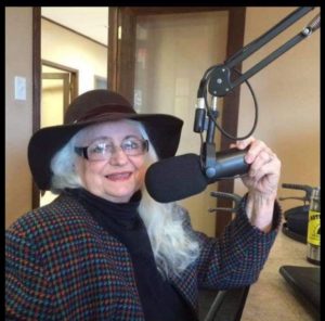Photo of Earth Mother Mary Lee Visnovske in the studio for her radio show Many Pearls of the Ozarks